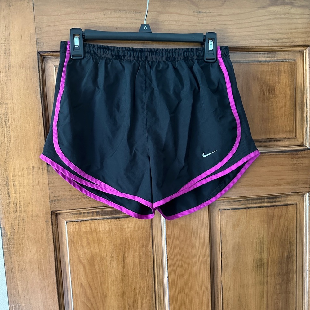 Nike Black and Pink Athletic Shorts with V-Notch Design